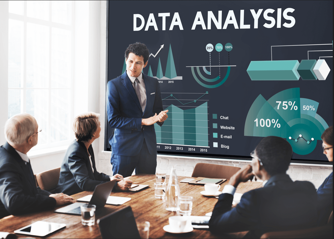 Team of marketers using sales data and analytics tools to implement data-driven strategies that increase revenue and improve performance.